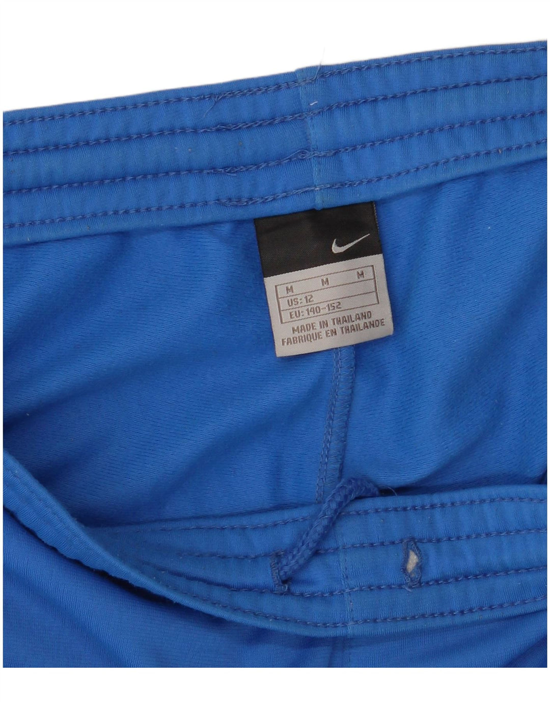 NIKE Grafiske træningsdragtbukser til drenge 10-11 år Medium Blue Colourblock