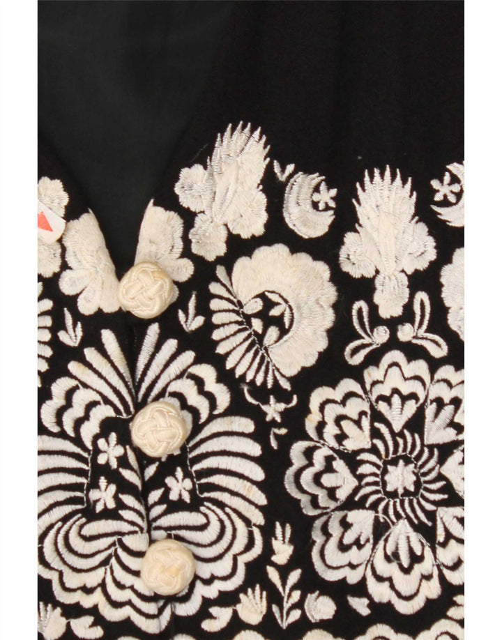 Vintage damevest UK 4 Lille sort blomstret uld