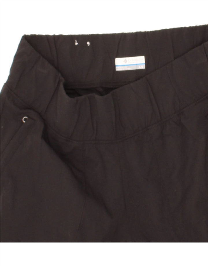COLUMBIA Womens Bootcut Casual Trousers Large W32 L30 Black Nylon Vintage Columbia and Second-Hand Columbia from Messina Hembry 