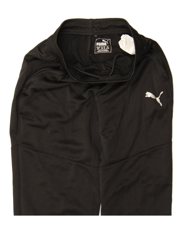 PUMA Boys Tracksuit Trousers 9-10 Years Medium Black Polyester Vintage Puma and Second-Hand Puma from Messina Hembry 