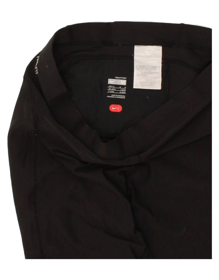 NIKE Womens Capri Tracksuit Trousers UK 12/14 Medium Black Polyester Vintage Nike and Second-Hand Nike from Messina Hembry 