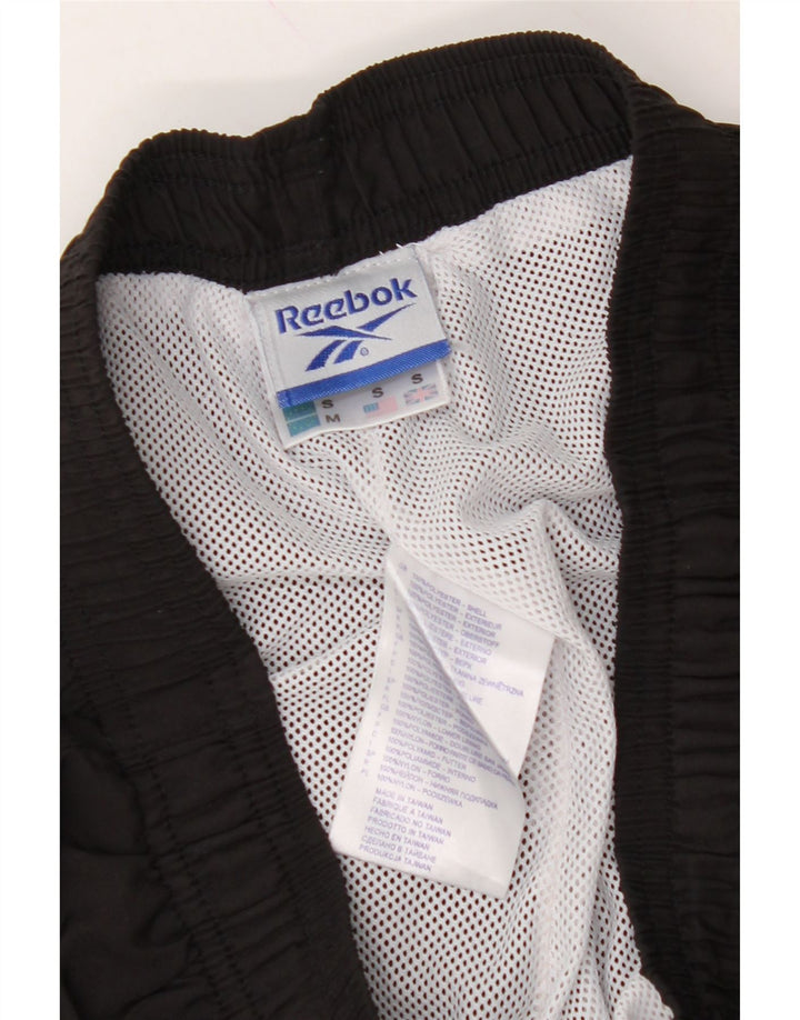 REEBOK Mens Tracksuit Trousers Small  Black Colourblock Polyester Vintage Reebok and Second-Hand Reebok from Messina Hembry 