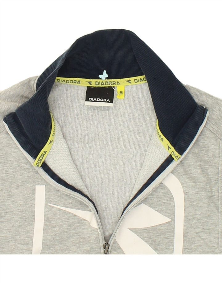 DIADORA Womens Graphic Tracksuit Top Jacket UK 14 Medium Grey Cotton | Vintage Diadora | Thrift | Second-Hand Diadora | Used Clothing | Messina Hembry 