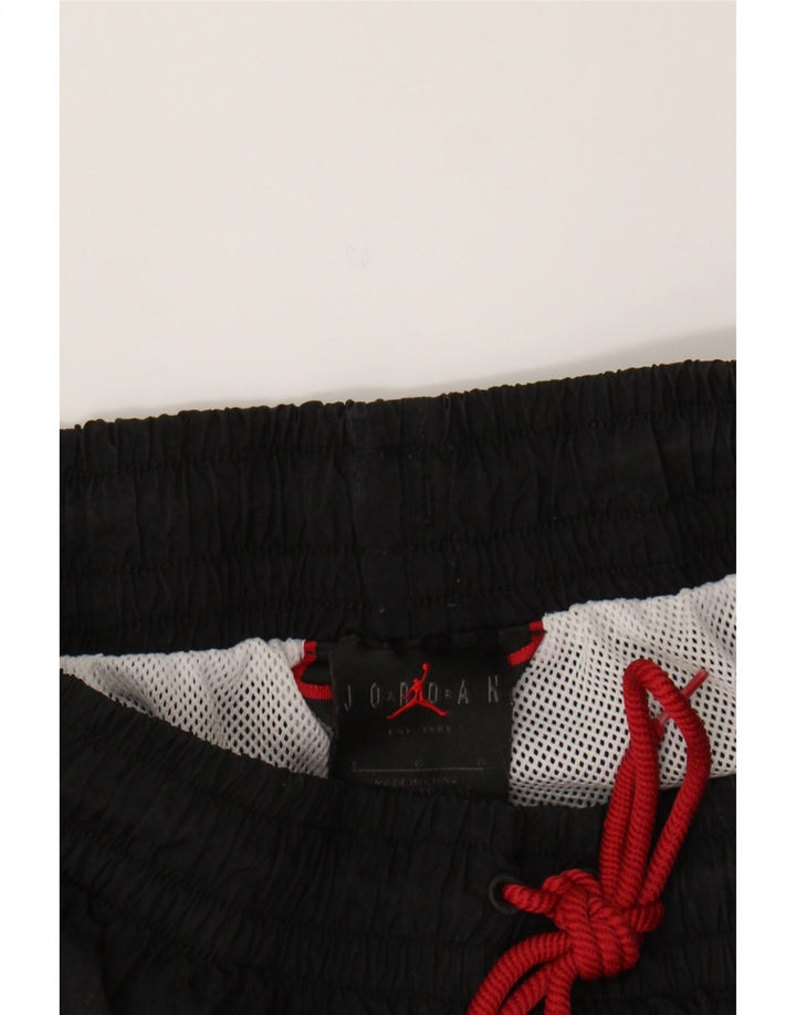 JORDAN Boys Graphic Sport Shorts 12-13 Years Large Black Polyester Vintage Jordan and Second-Hand Jordan from Messina Hembry 
