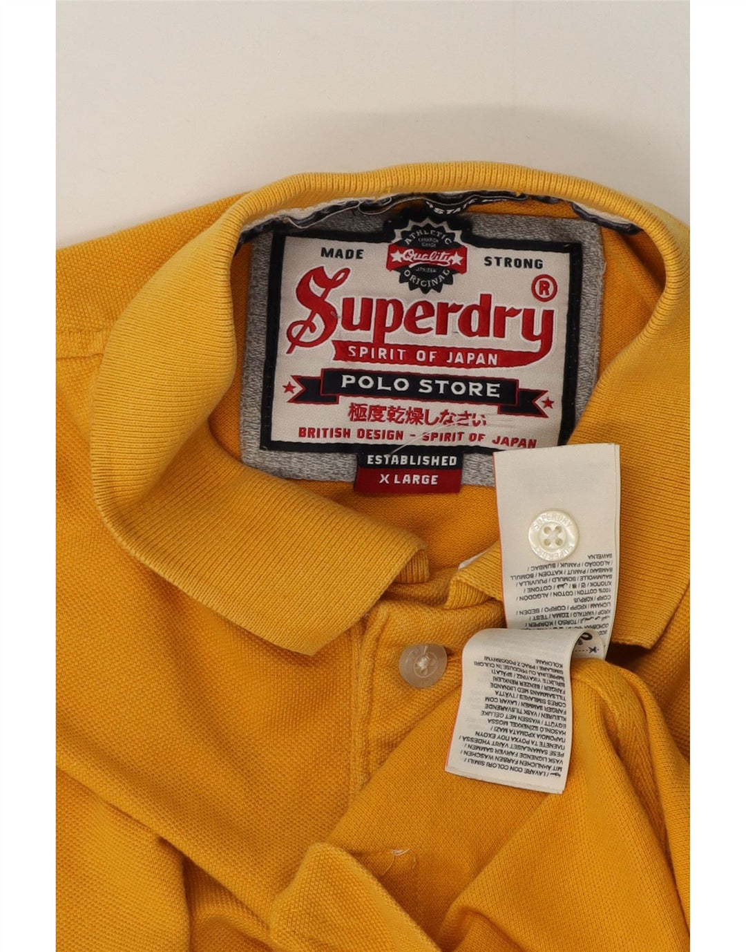 Superdry grafisk poloshirt til mænd XL gul bomuld