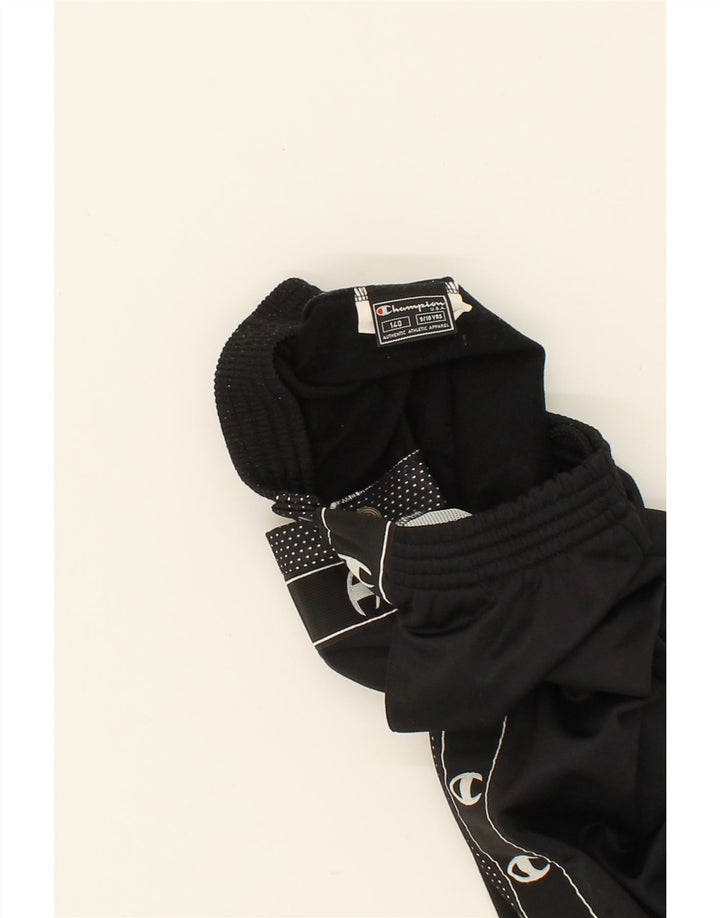 CHAMPION Boys Graphic Tracksuit Trousers 9-10 Years Black Polyester Vintage Champion and Second-Hand Champion from Messina Hembry 