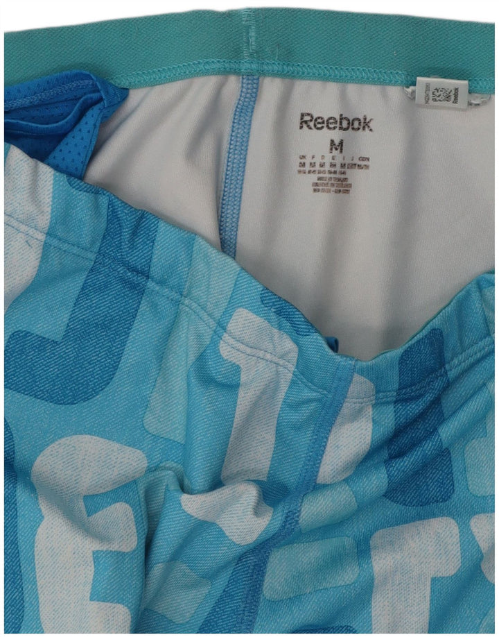 REEBOK Grafisk træningsdragtsbukser til kvinder UK 12 Medium Blue Colourblock