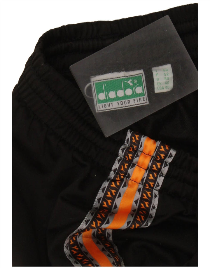 DIADORA Træningsdragtsbukser til mænd UK 40 Medium Sort Colourblock