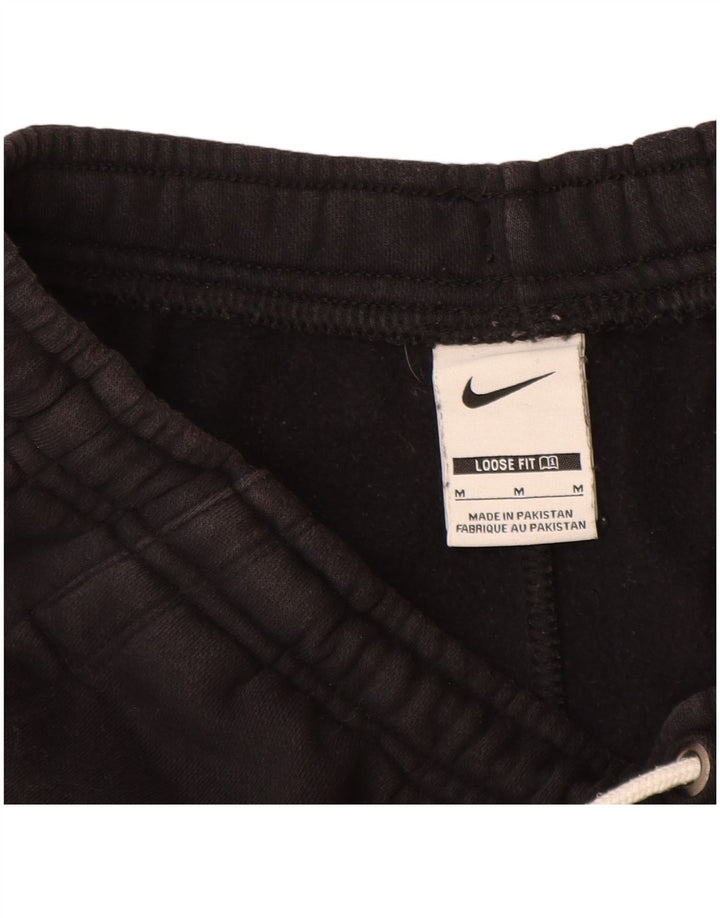 NIKE sportsshorts til kvinder med løs pasform UK 12 Medium sort bomuld