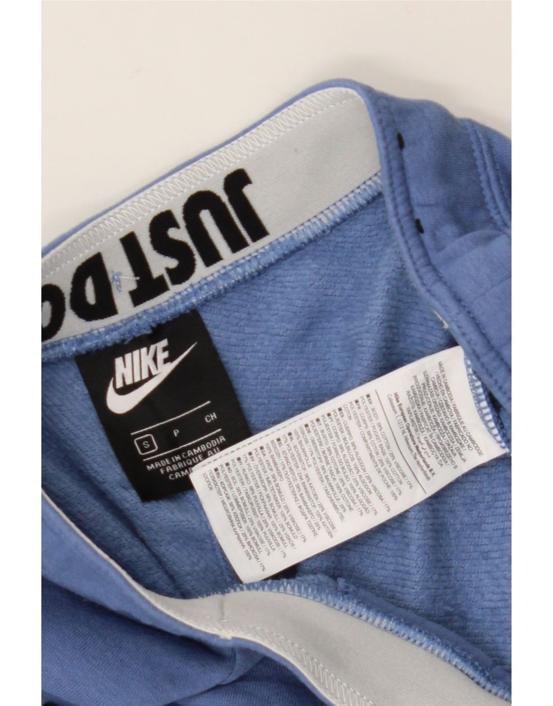 NIKE Mens Graphic Tracksuit Trousers Joggers Small Blue Cotton