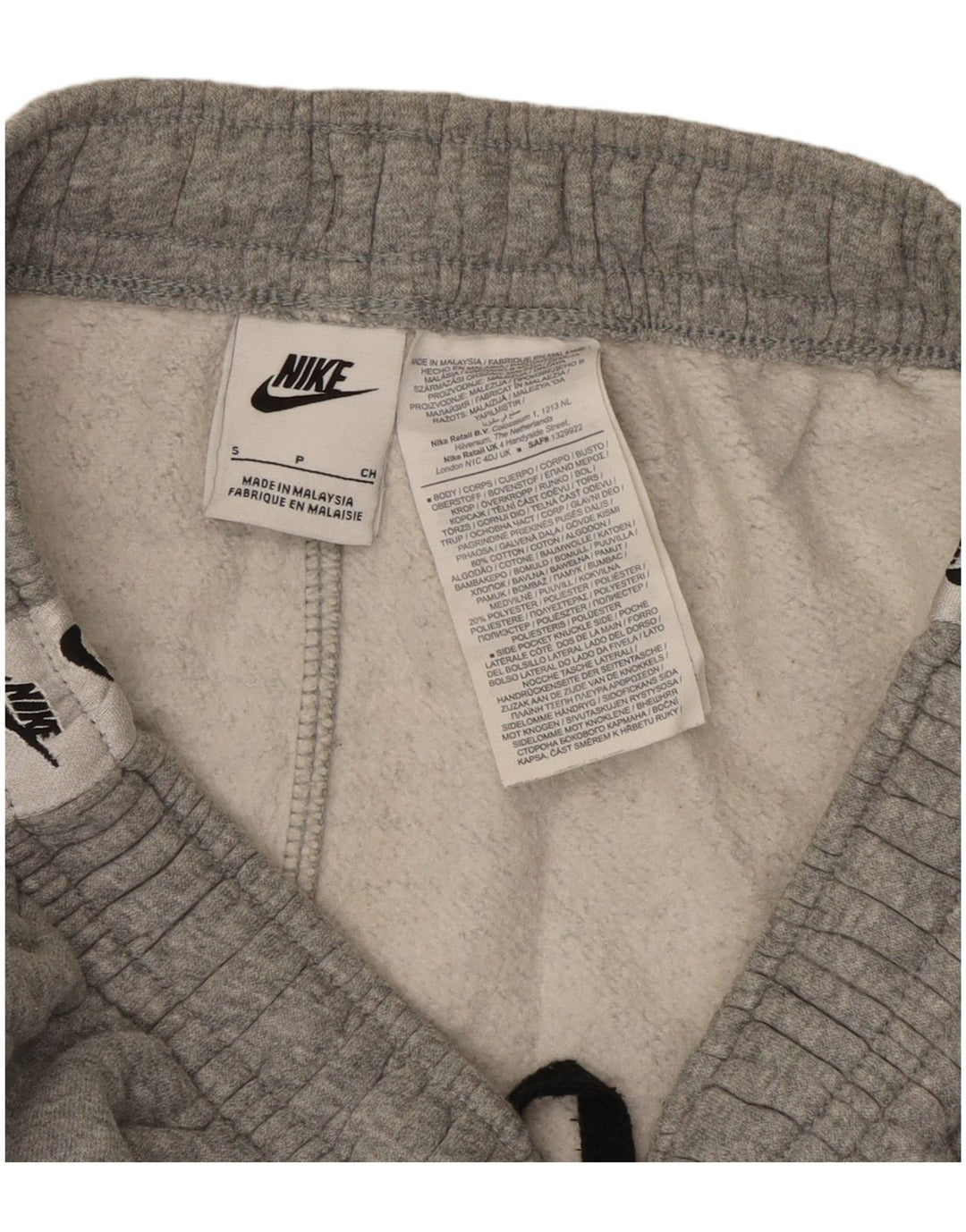 NIKE træningsbukser til kvinder Joggers UK 8 Small Grey Colourblock