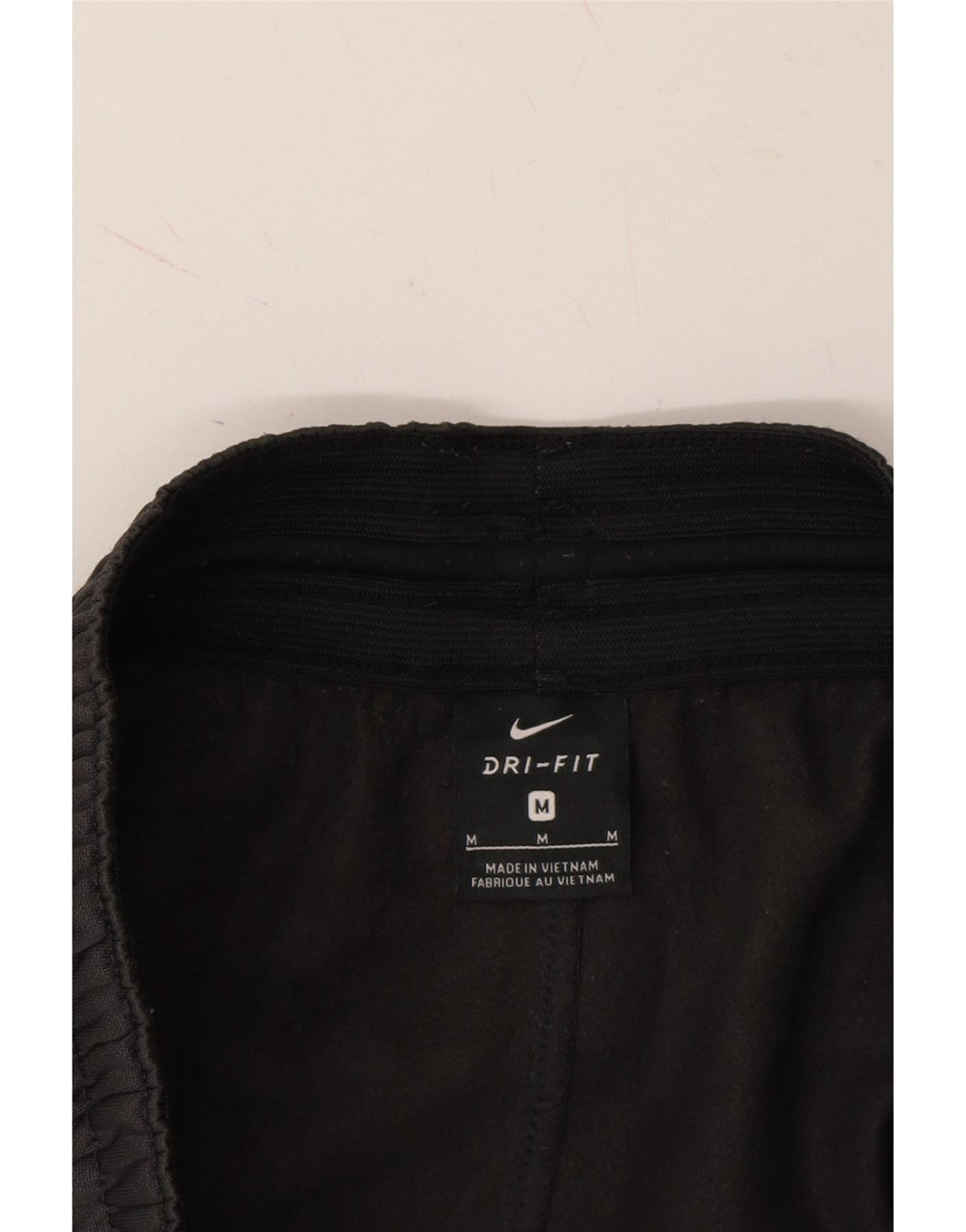 NIKE Mens Dri Fit Graphic Tracksuit Trousers Joggers Medium Black Vintage Nike and Second-Hand Nike from Messina Hembry 