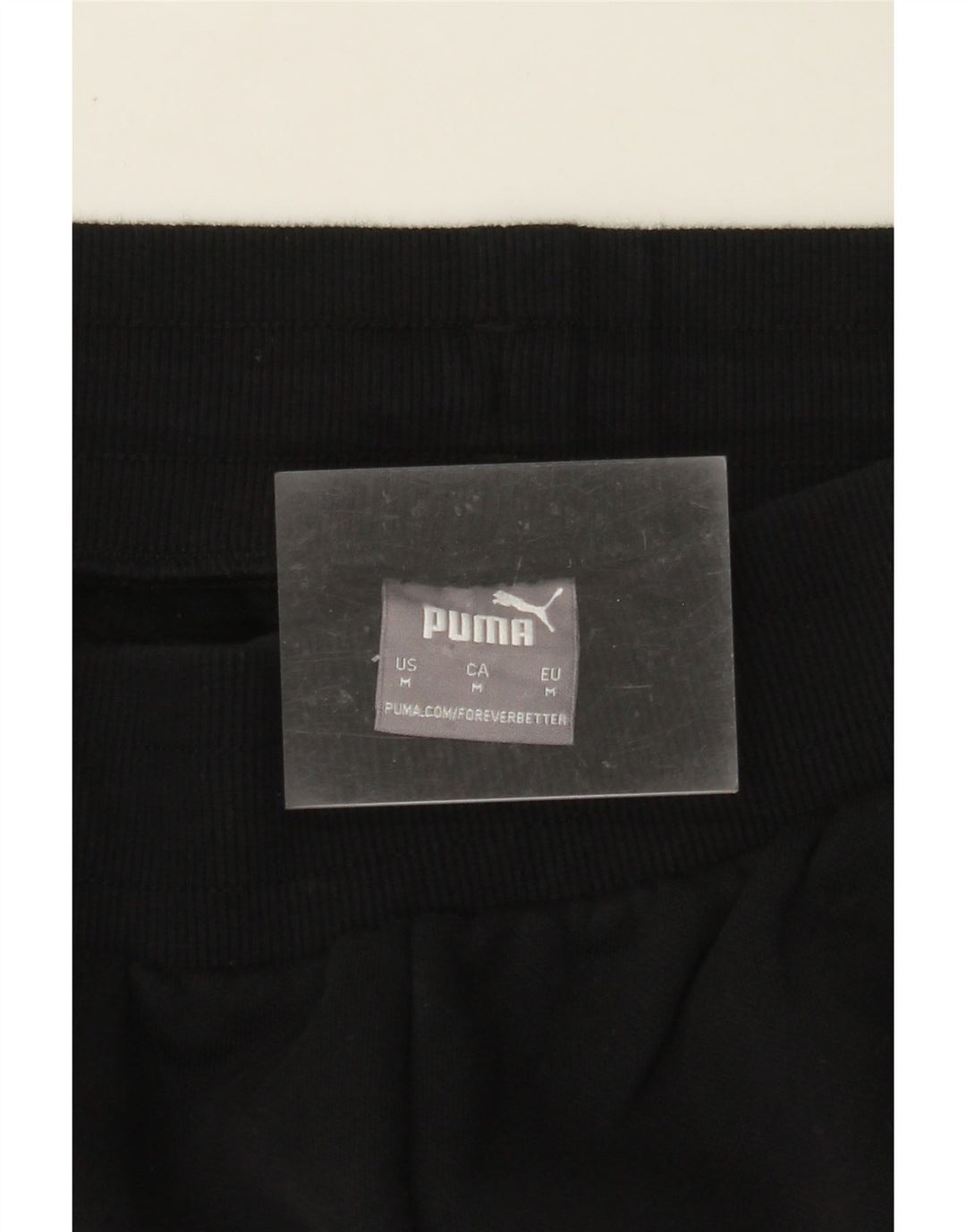PUMA træningsdragt til kvinder Joggers UK 12 Medium Sort