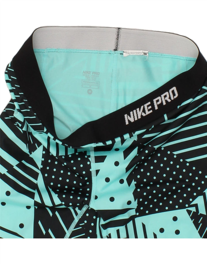 NIKE Womens Dri Fit Abstract Pattern Capri Leggings UK 12 Medium Blue Vintage Nike and Second-Hand Nike from Messina Hembry 