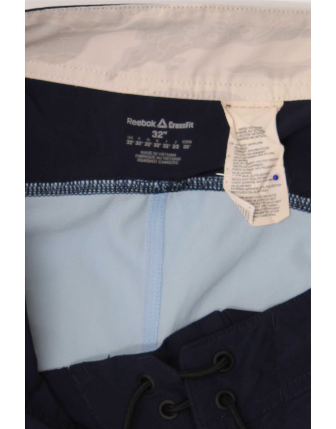 Reebok Herre grafiske svømmeshorts Medium Blue Colourblock Nylon