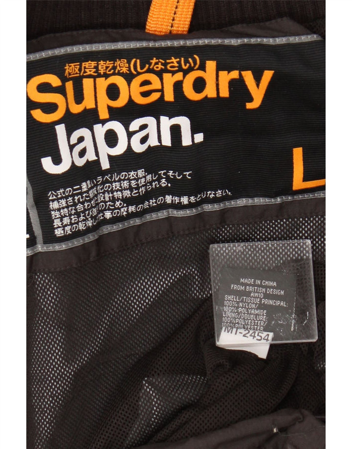 Superdry Regnjakke til kvinder UK 14 Stor sort nylon