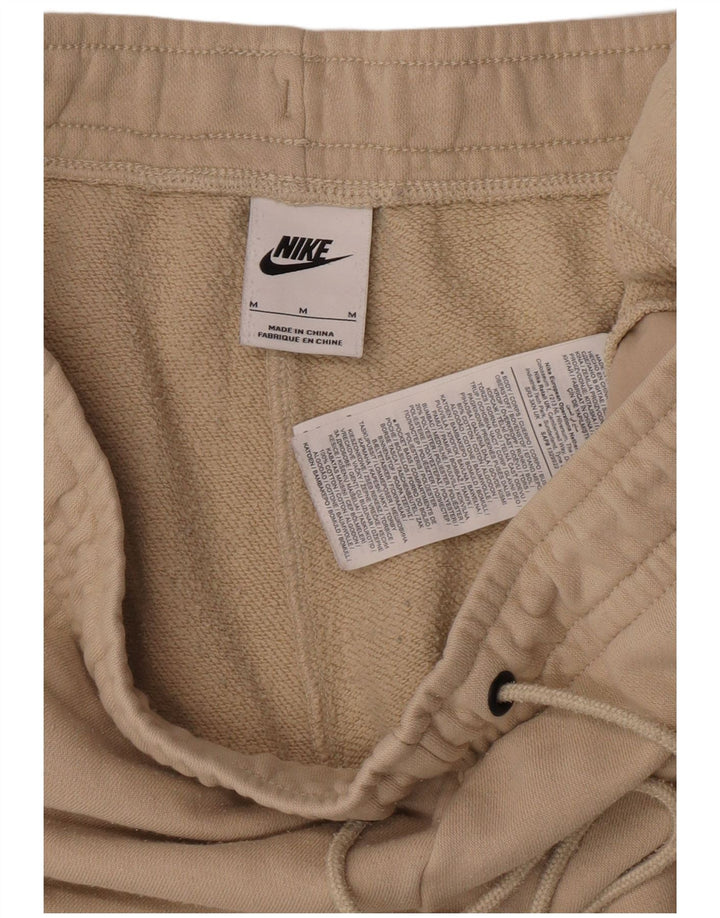 Nike træningsdragt til kvinder Joggers UK 12 Medium Beige Bomuld