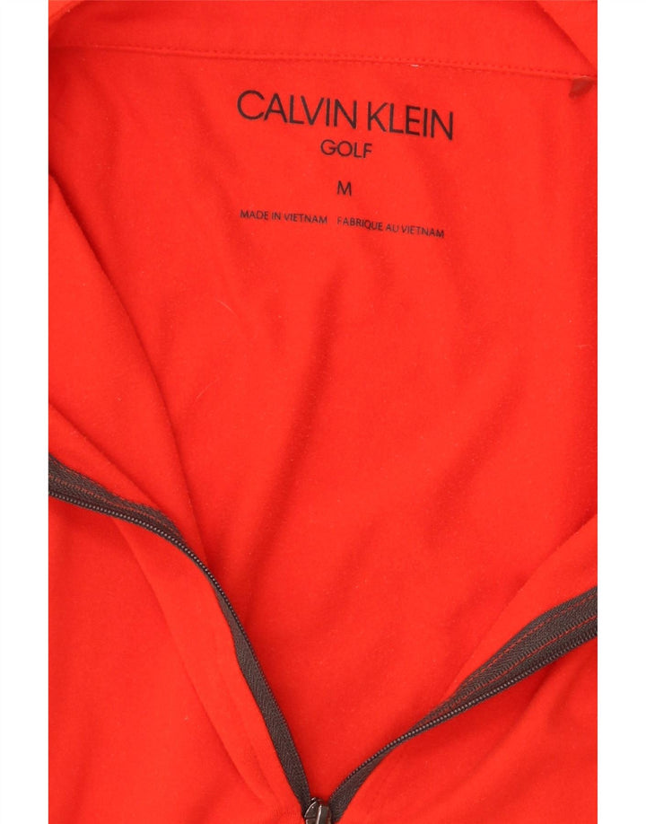 CALVIN KLEIN Mens Golf Zip Neck Pullover Tracksuit Top Medium Orange Vintage Calvin Klein and Second-Hand Calvin Klein from Messina Hembry 