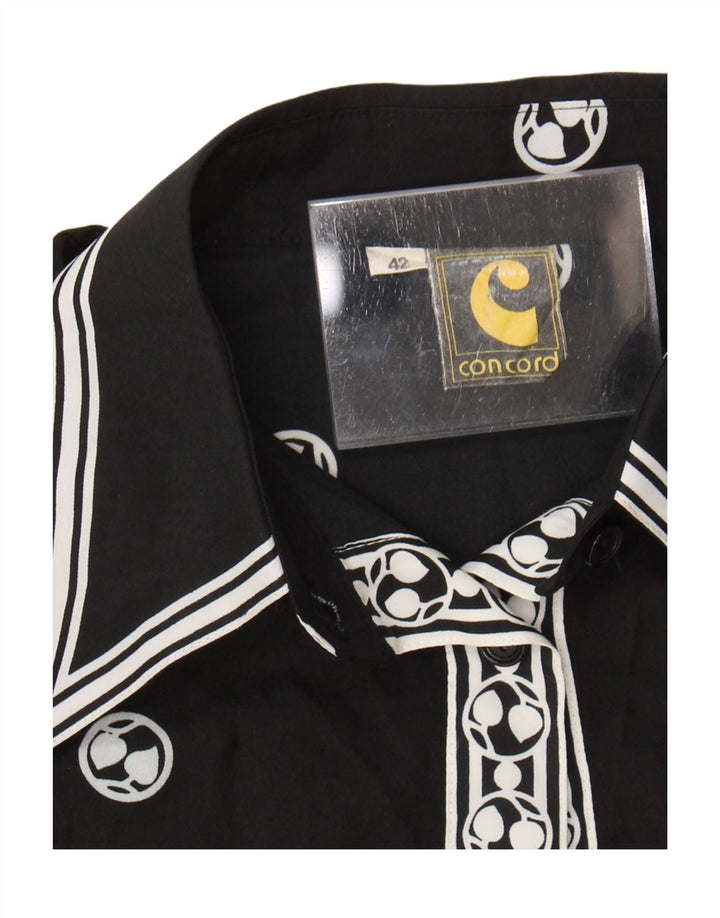 Vintage dameskjorte bluse EU 42 stor sort geometrisk polyester