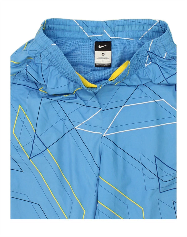 NIKE Boys Sport Shorts 10-11 Years Medium Blue Geometric Polyester Vintage Nike and Second-Hand Nike from Messina Hembry 