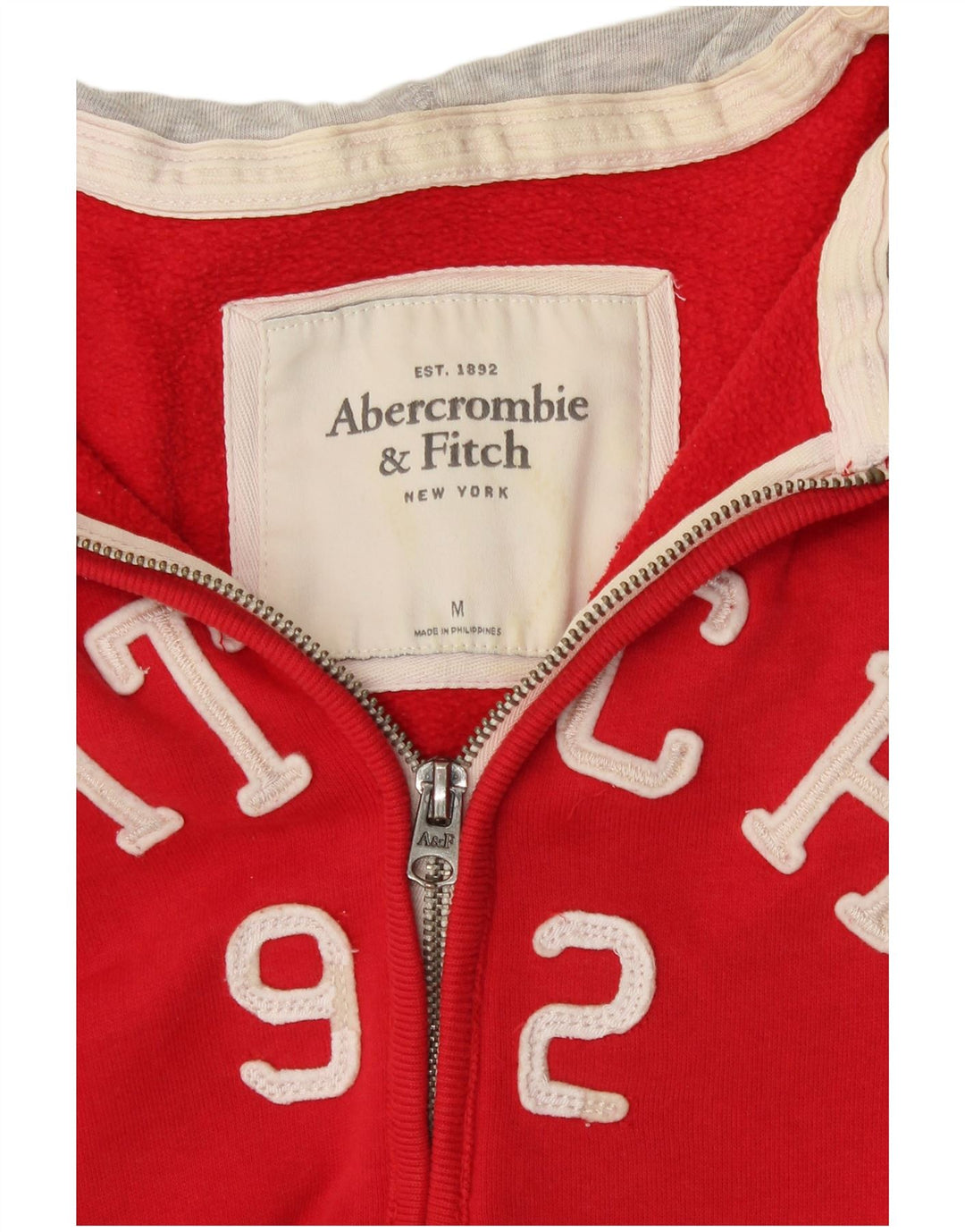 Abercrombie & Fitch Grafisk hættetrøje med lynlås til kvinder UK 12 Medium Rød