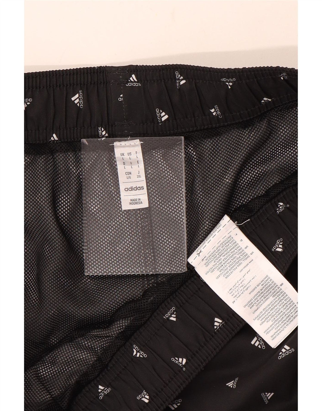 Adidas grafiske badeshorts til mænd, store sortplettede polyester