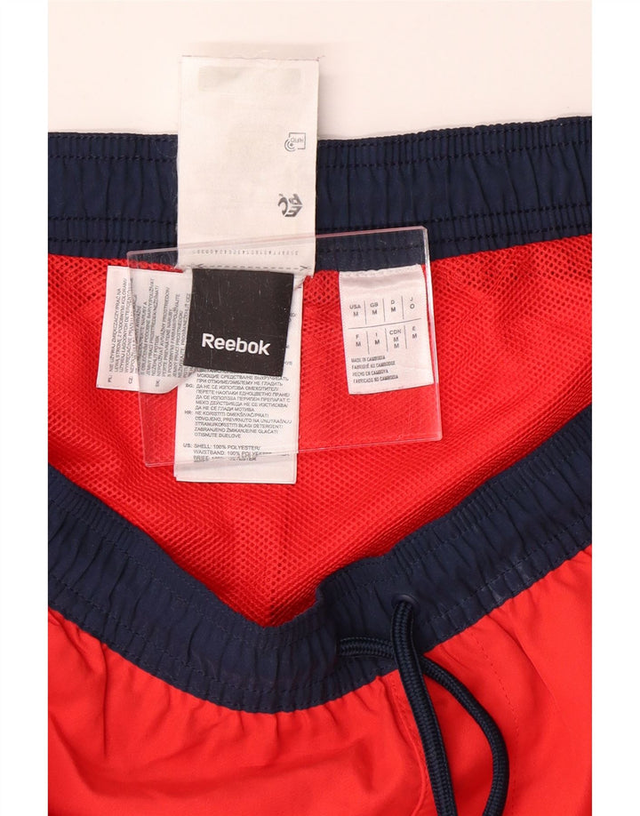 REEBOK Herre grafiske sportsshorts Medium rød polyester
