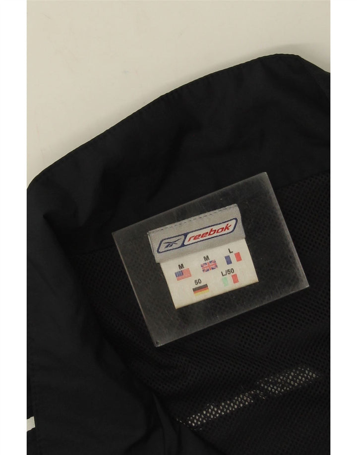 Reebok Herre Loose Fit træningsdragt Topjakke Medium Sort Colourblock